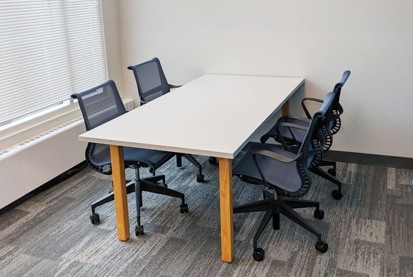 Heritage Conference Room (4-person) with table and four chairs.