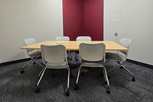Kaposia Conference Room 3 with table and 6 chairs.