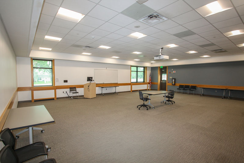 Pleasant Hill Large Meeting Room with single table and two chairs in a large open space.
