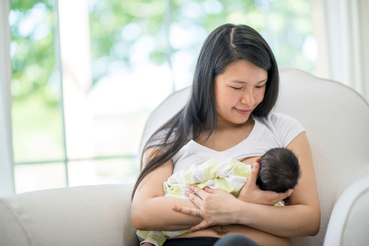 Mom breastfeeding baby.
