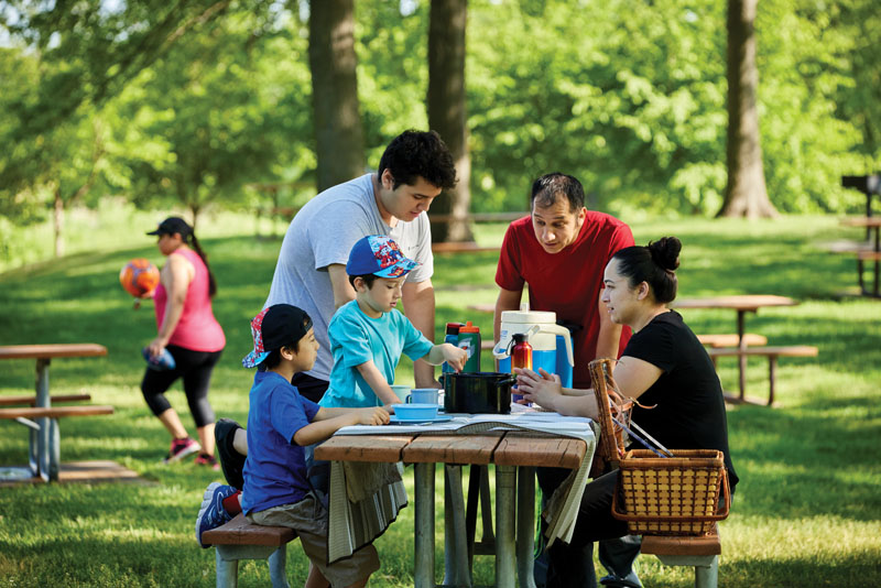Family having a picnic at Lebanon Hills Regional Park.