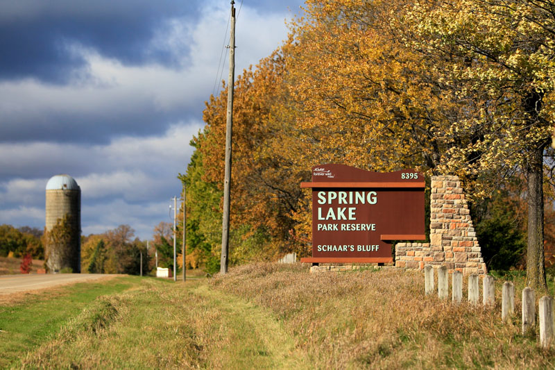 A monument sign for Spring Lake Park Reserve Schaar's Bluff.